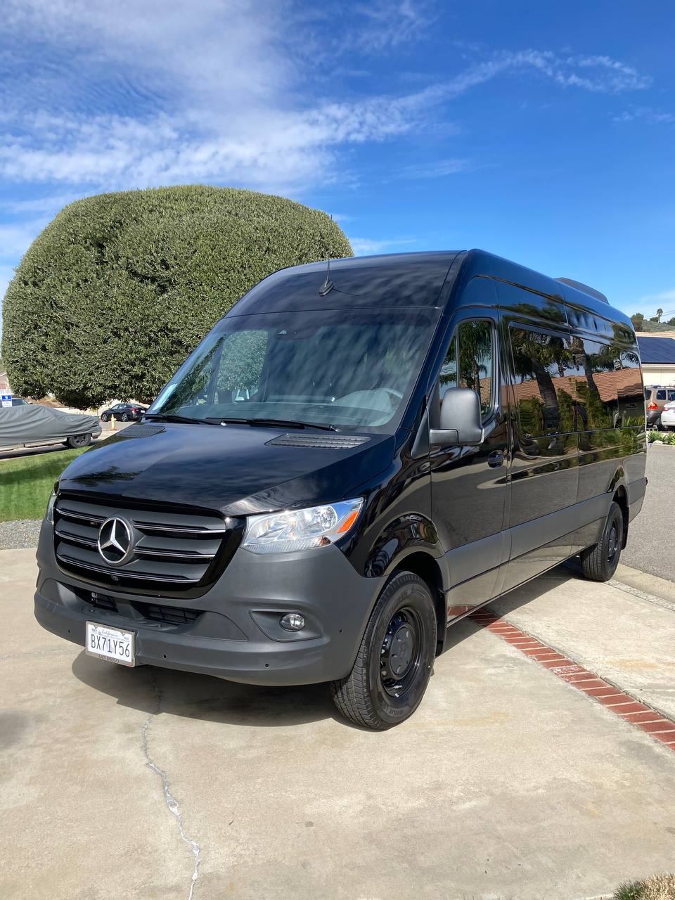 Black Sprinter high-roof passenger van for group transportation rental in Chicago