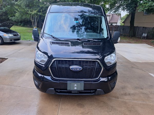 Black Ford Transit 12-seater van rental in Charlotte, NC