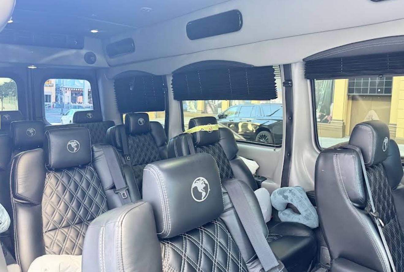 Luxury Mercedes-Benz Sprinter van interior with quilted leather captain seats in Charlotte, NC