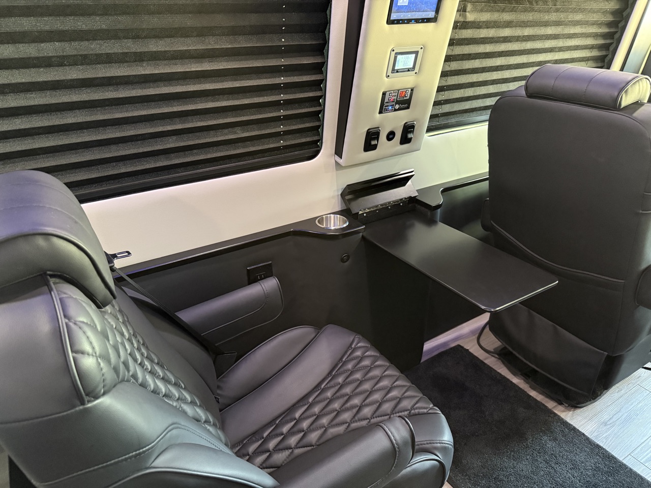 Luxury Mercedes-Benz Sprinter van captain chair with blinds for Lubbock, TX rentals