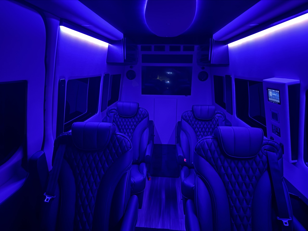 Mercedes-Benz Sprinter passenger van interior with ambient lighting for Lubbock, TX night travel