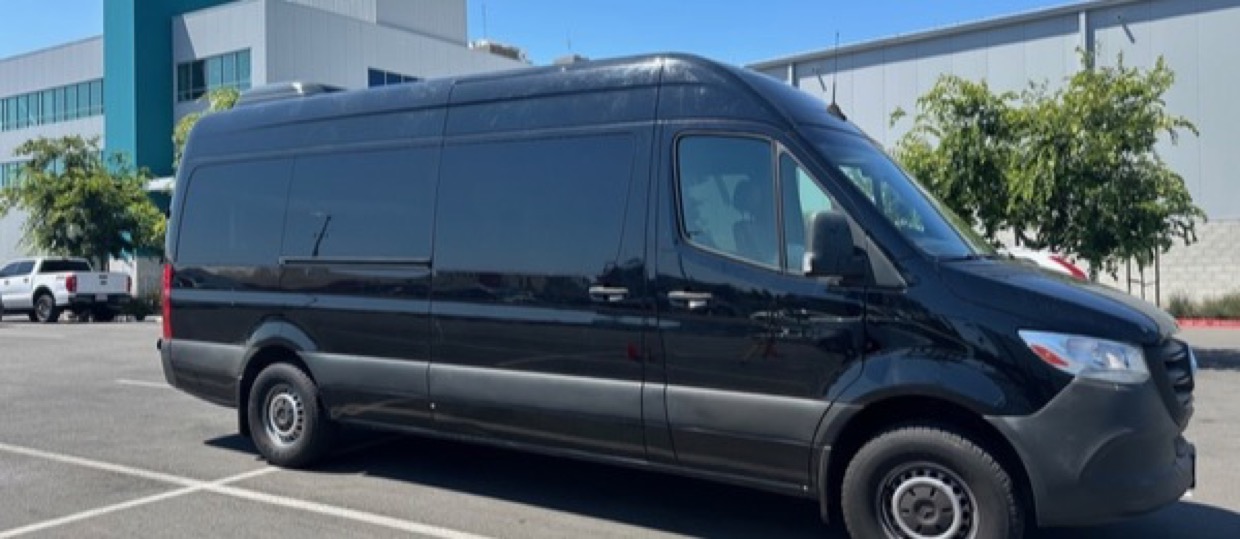 Black Mercedes-Benz Sprinter passenger van available for rent in Montgomery, AL near MGM airport