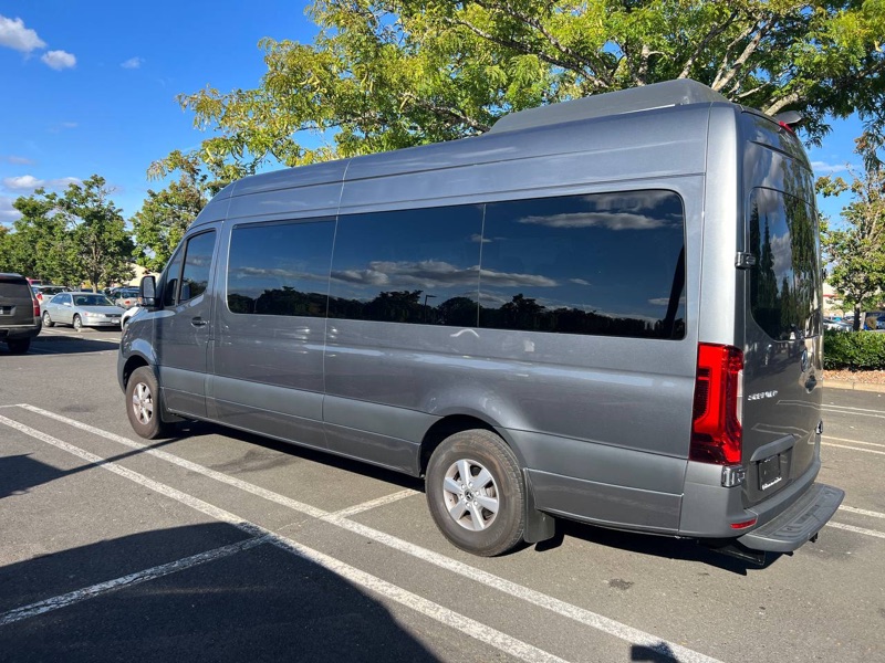 Mercedes-Benz Sprinter van side profile available for rent in Raleigh, NC