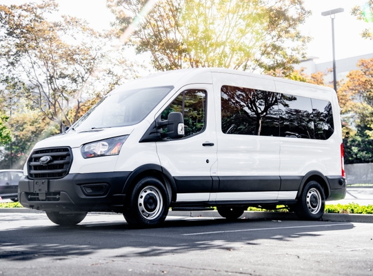 Ford Transit 12-passenger tall white van for rent in San Jose