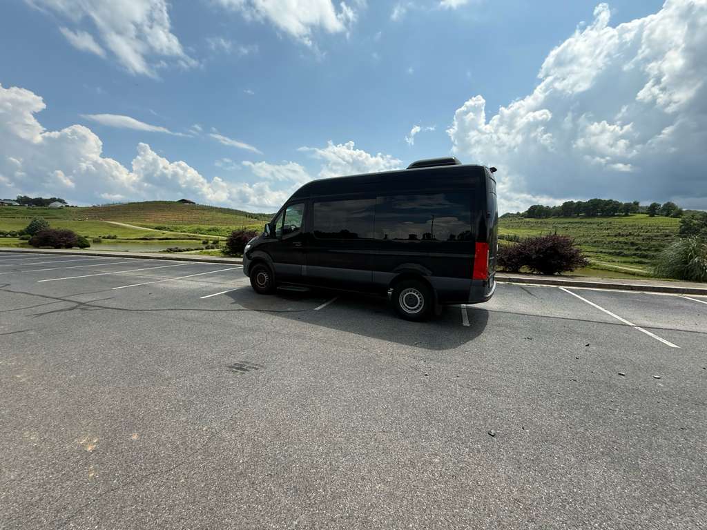 Customer group traveling with a Sprinter van rental from San Jose