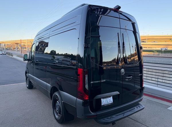 Sprinter van rear bumper step for easy boarding — Seattle van rental