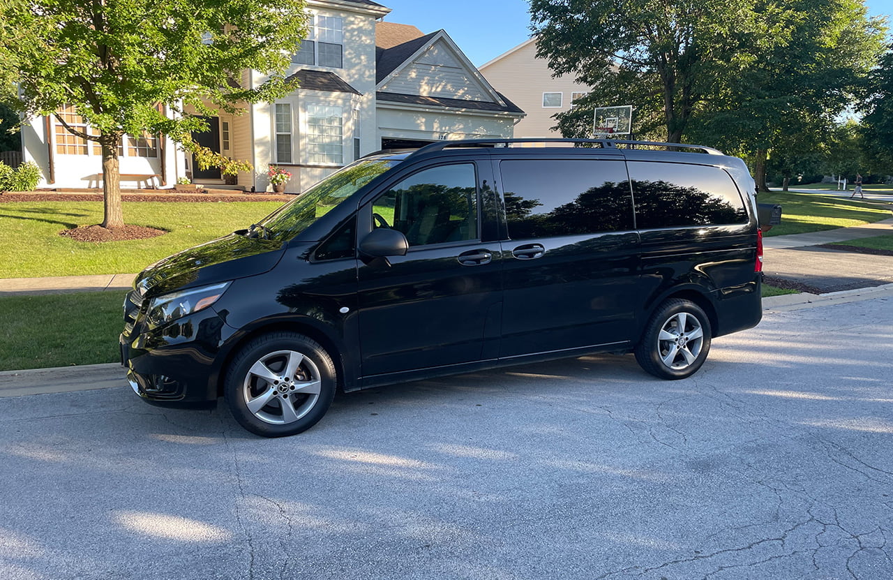 8 Seater Black Metris Minivan van rental